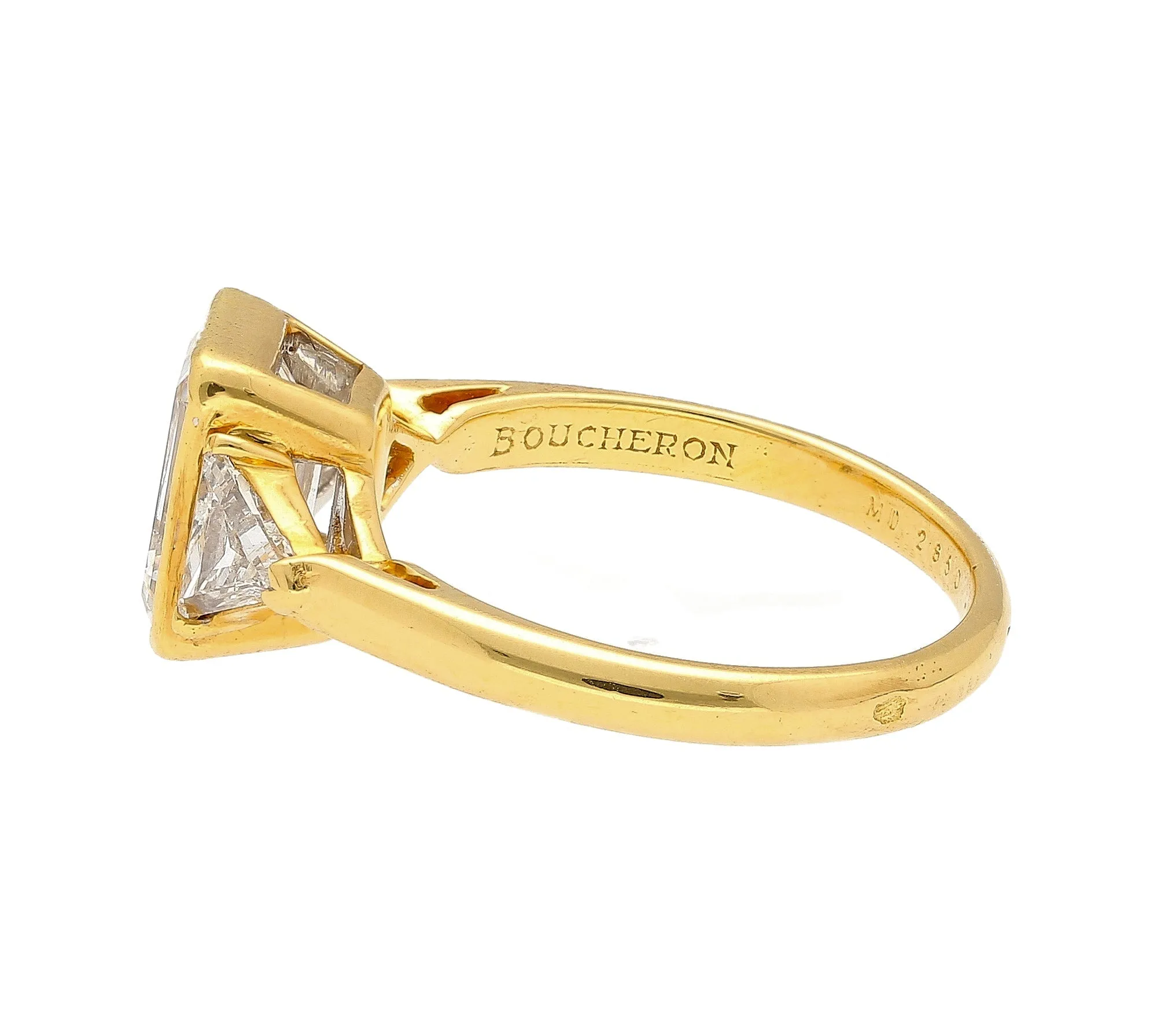 Boucheron Signed Ring With Bezel Set GIA Certified 2.09 Carat Emerald Cut E/SI1 Diamond and Trillion Side Stones