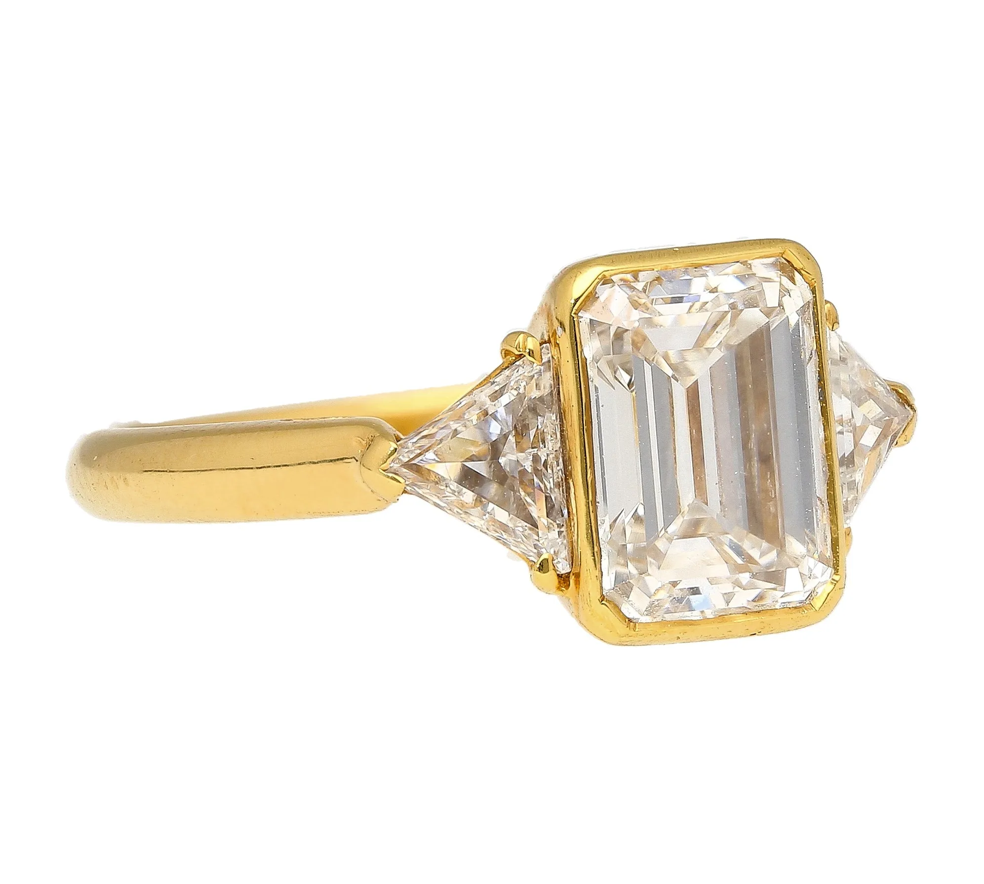 Boucheron Signed Ring With Bezel Set GIA Certified 2.09 Carat Emerald Cut E/SI1 Diamond and Trillion Side Stones