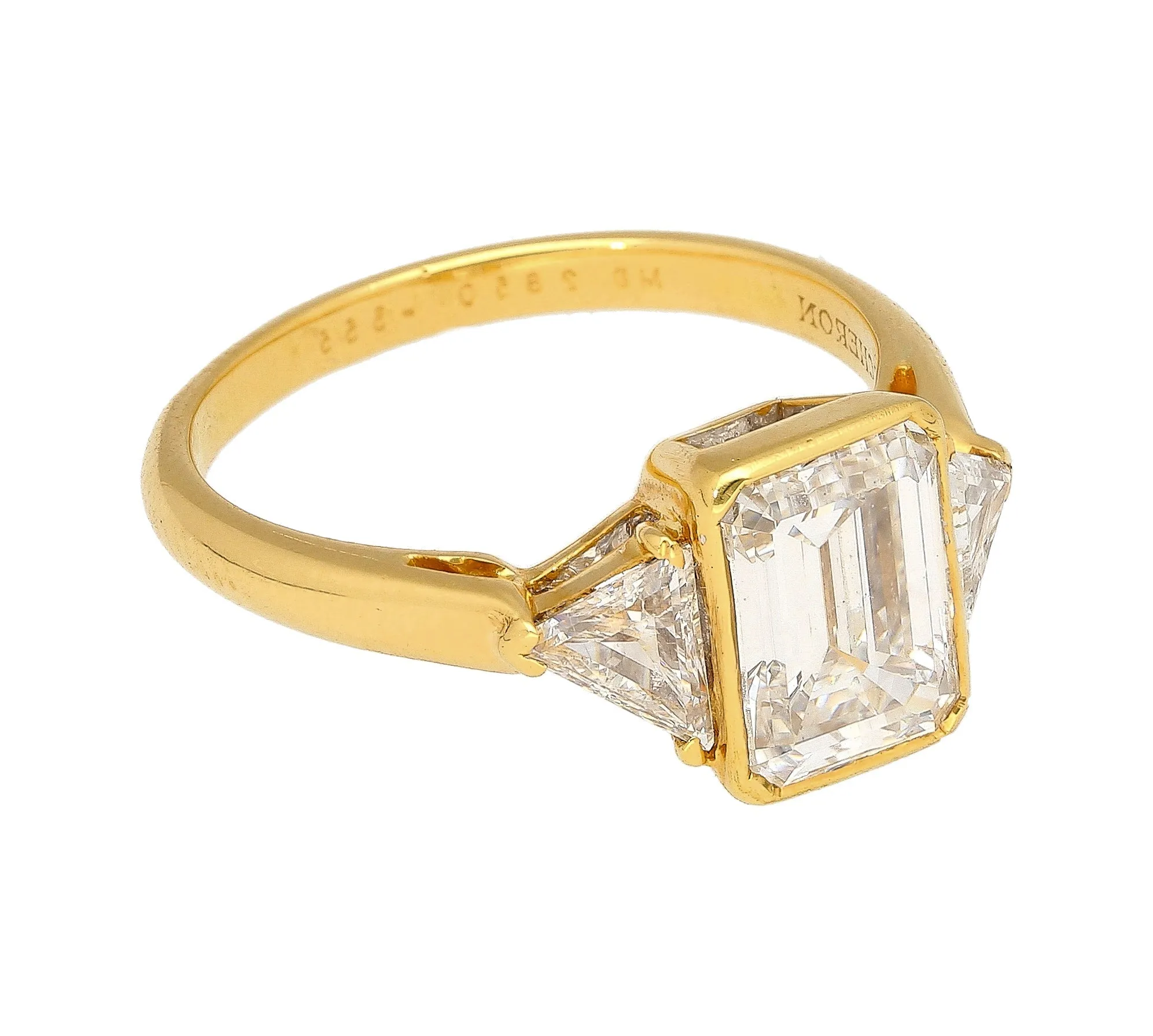 Boucheron Signed Ring With Bezel Set GIA Certified 2.09 Carat Emerald Cut E/SI1 Diamond and Trillion Side Stones
